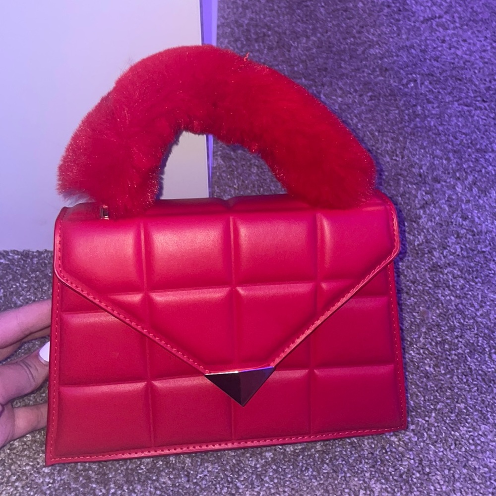 Red fuzzy handbag
